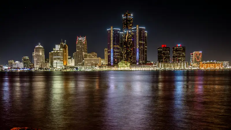 Detroit skyline at night across the river