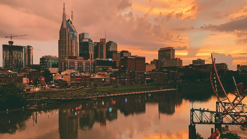 Nashville skyline at sunset over the Cumberland River