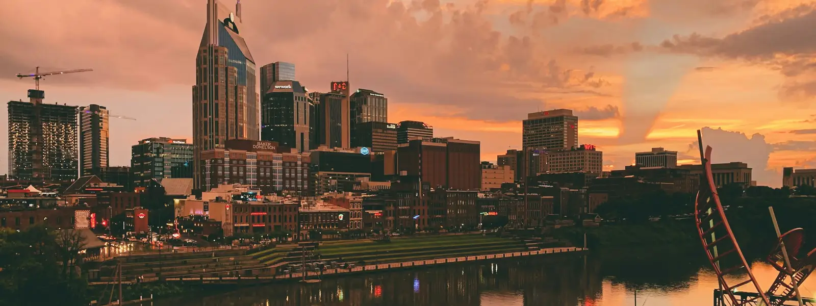 Nashville skyline at sunset over the Cumberland River